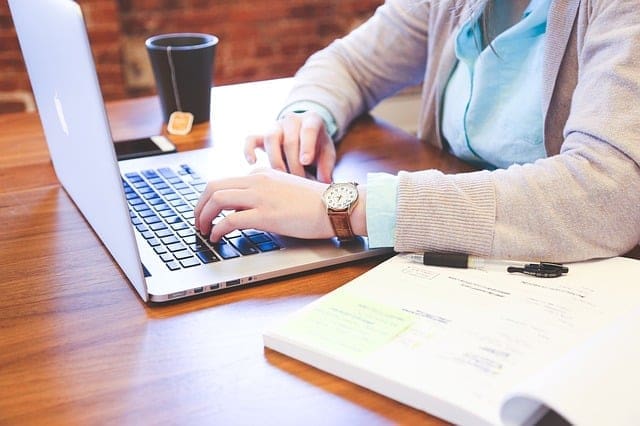 Student working to pay off loan