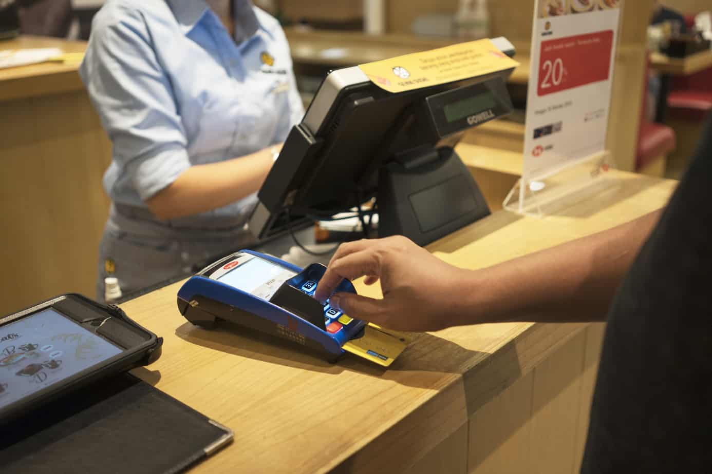 customer paying order by credit card 129447387 retail merchants trends 2020