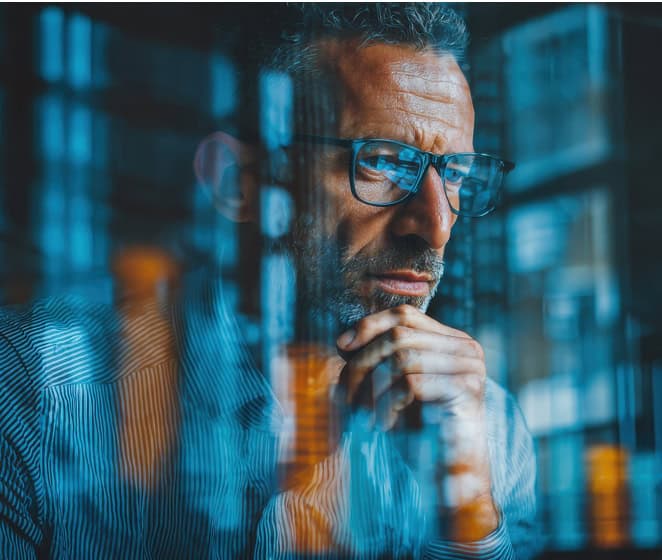 Professional man analyzing financial data through glass window, business decision, and payment processing.