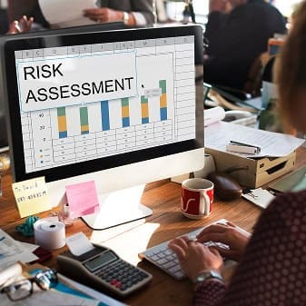 Risk assessment business analysis on computer screen for merchant services.