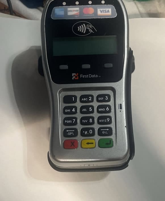 Contactless payment terminal for secure card transactions at Host Merchant Services.