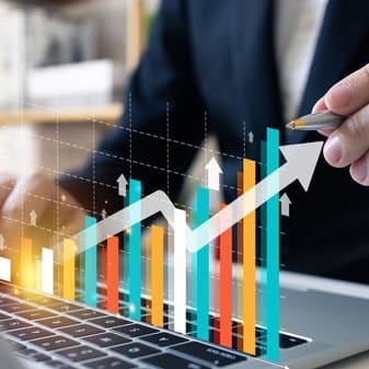 Business growth analytics with upward trending bar and line charts.