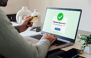 Secure online payment processing on laptop for business transactions.