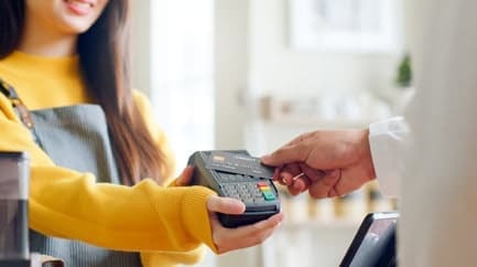 Secure payment processing with a card reader at Host Merchant Services.
