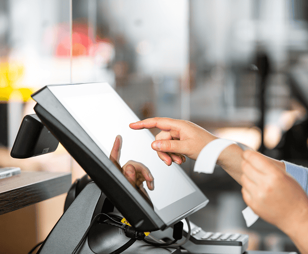 Touchscreen point-of-sale device at Host Merchant Services for seamless payment processing.
