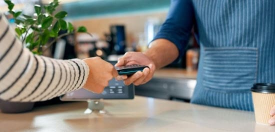 Secure credit card payment being processed at a retail checkout.