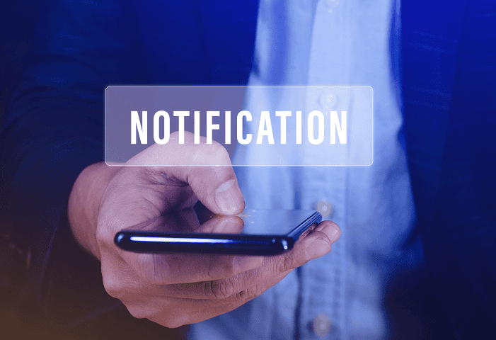 Mobile phone notification about merchant services update.