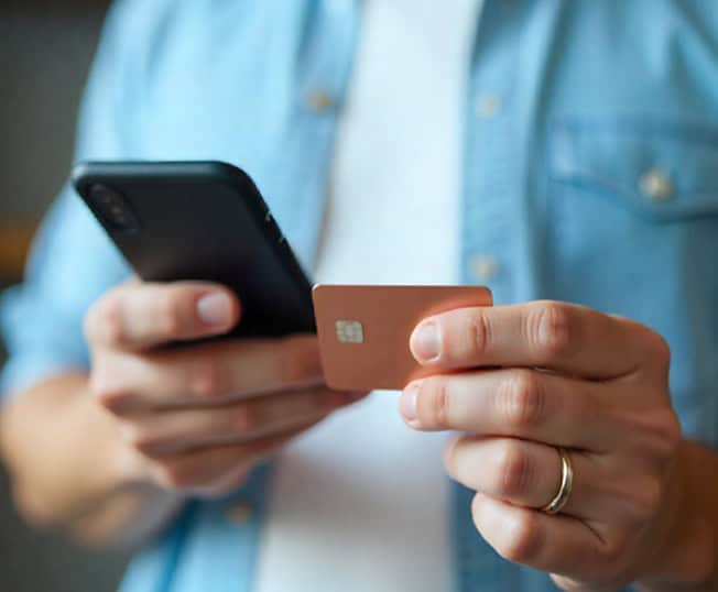 Easy mobile payment with a credit card and smartphone for seamless merchant transactions.