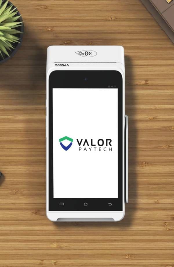 Contactless payment terminal with Valor PayTech logo for merchant payment solutions.